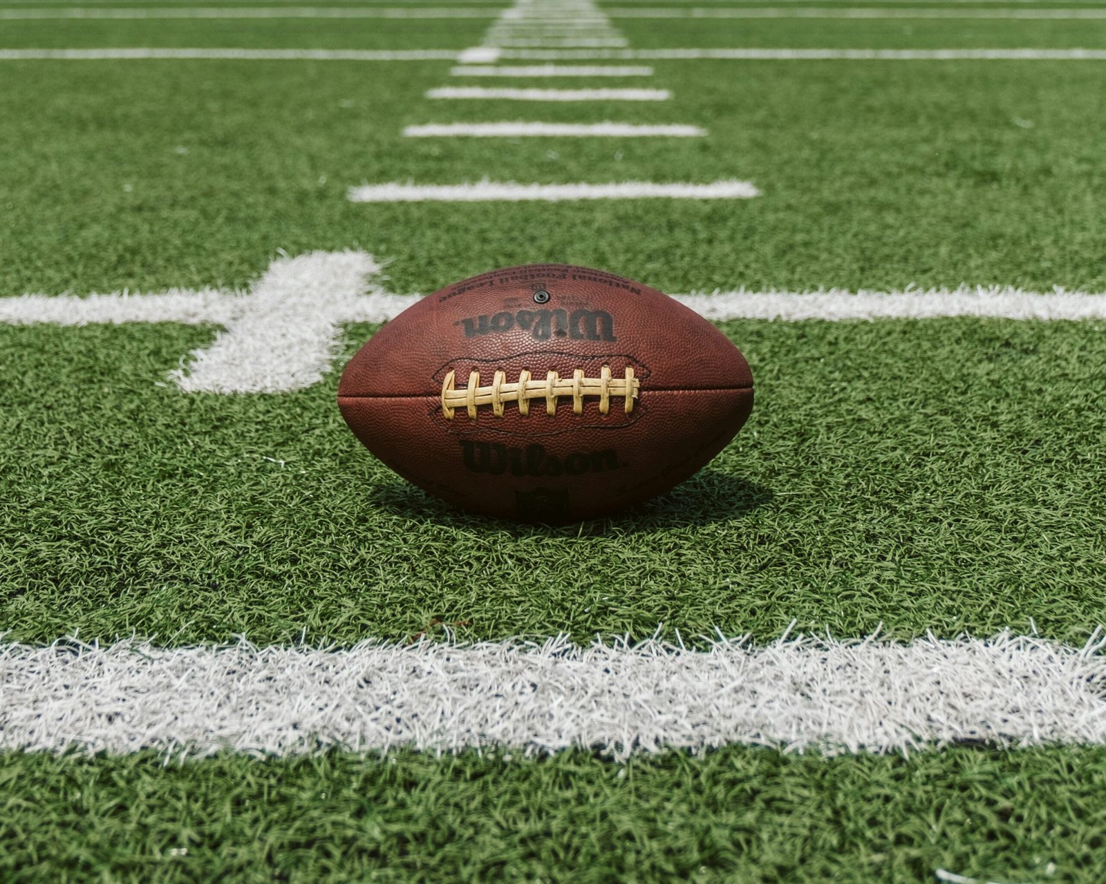 Football on the yard line, representing checking every trade against real context before accepting it